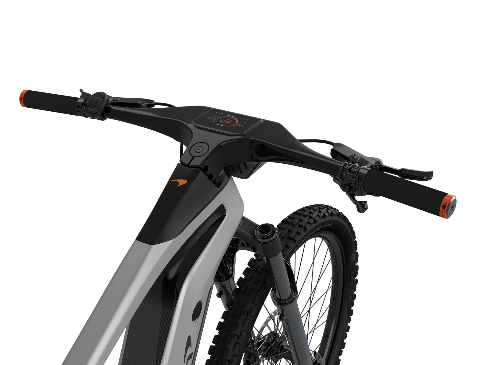 Close up shot of the front end of the McLaren Sport carbon hardtail electric mountain bike showing the one-piece integrated handlebar, stem, and digital display unit.
