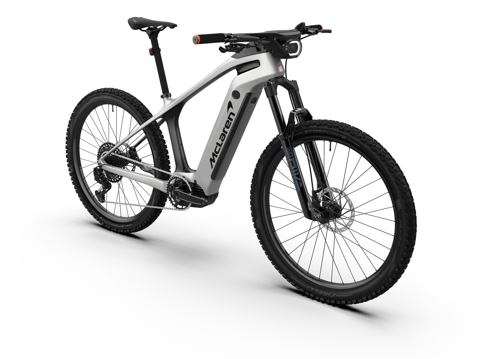 Front-facing three-quarter angle view of the McLaren Sport 29er hardtail electric mountain bike showing the integrated headlight, Lyrik fork, and Pirelli Scorpion tires.
