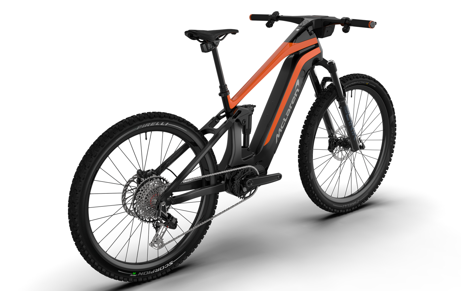 Three-quarter angle view from the rear of the carbon McLaren full suspension eMTB featuring 29 inch front wheel and 27.5 inch rear wheel, SRAM Eagle drivetrain and integrated cockpit with high-definition digital display.