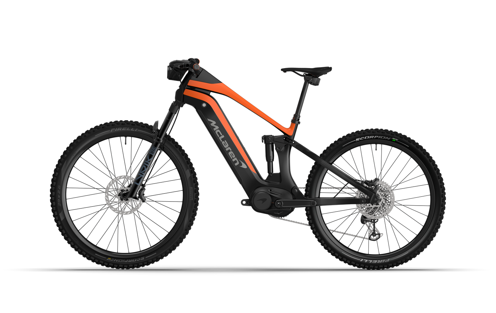 Non-drive side view of the McLaren Extreme eMTB featuring a 600W motor, 140mm of front and rear travel, and robust but lightweight carbon frame wrapped 3k carbon weave. 